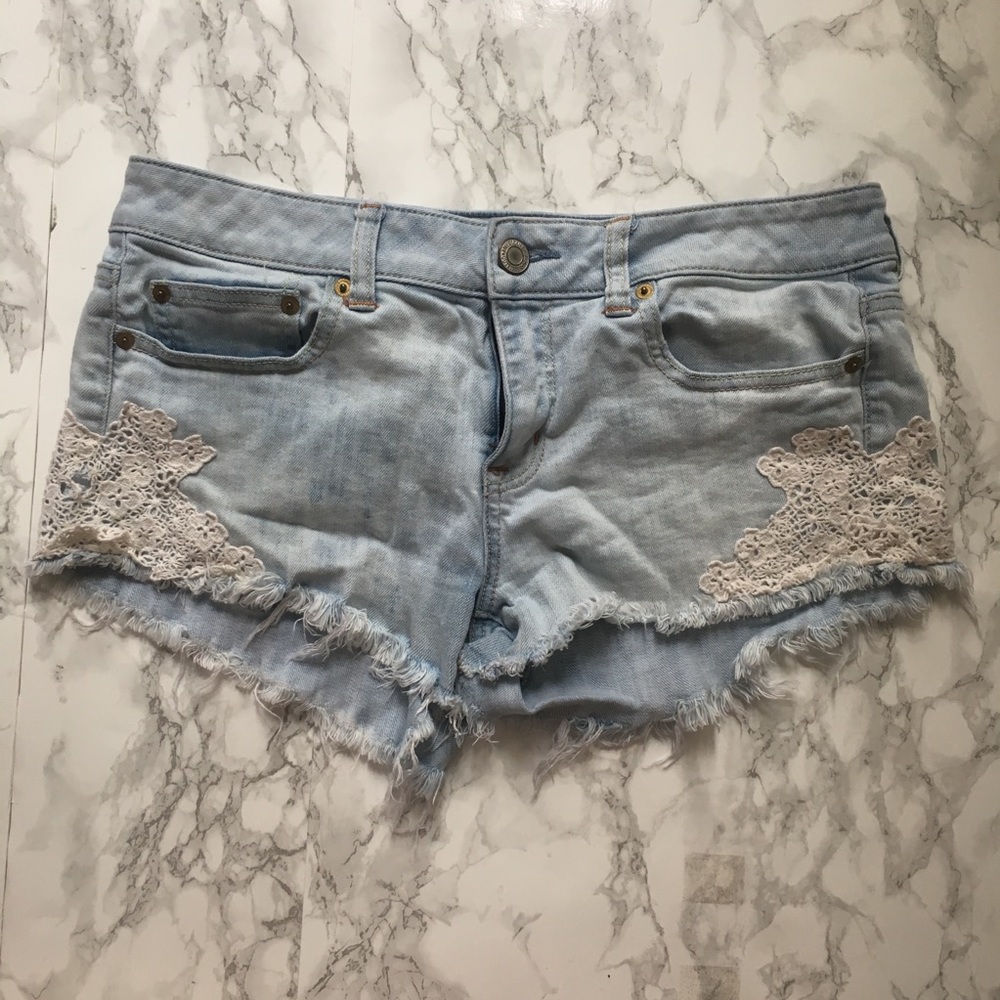 Cut off denim American eagle shorts with lace